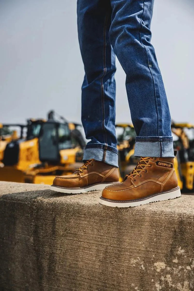 Men's Reclaimer wedge waterproof steel toe work boots in pyramid color by CAT worn view