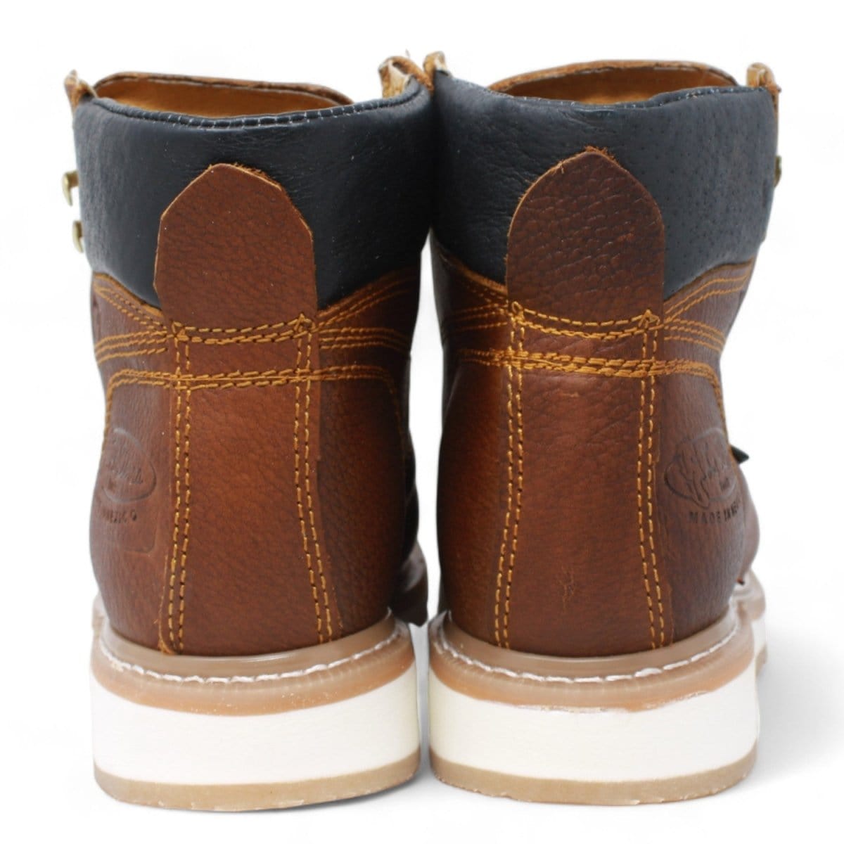 Men's lace up work boots with sierra sole in brown by La Carreta back pair view