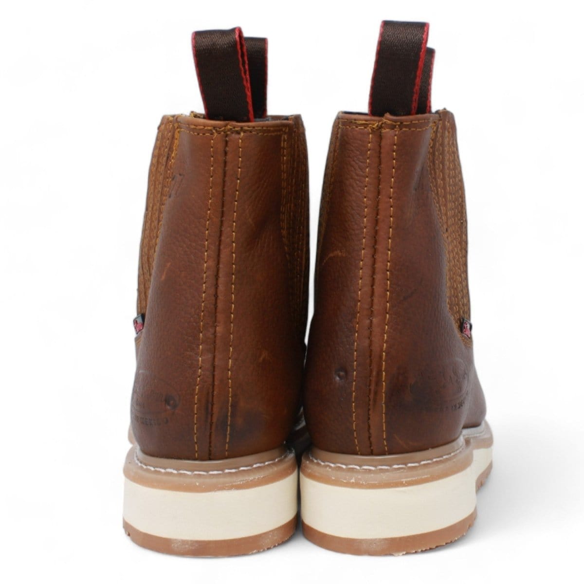Men's round toe work boots with rubber sole in gold color by La Carreta back view