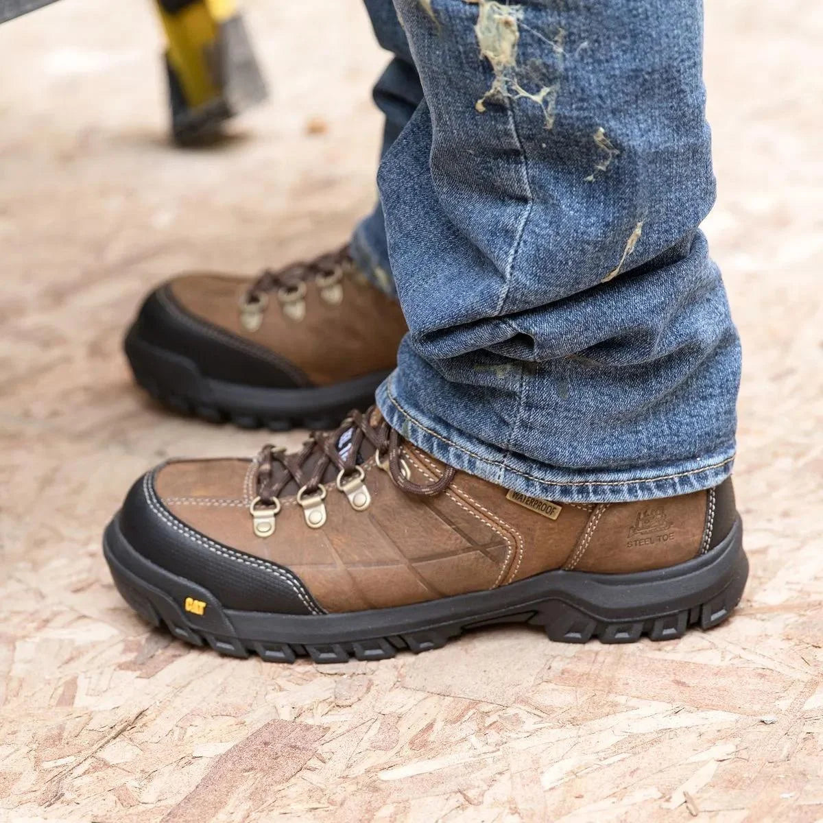 Men's Threshold waterproof steel toe work boots in real brown by CAT worn view