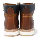Men's lace up work boots with sierra sole in brown by La Carreta back pair view