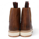 Men's round toe work boots with rubber sole in gold color by La Carreta back view